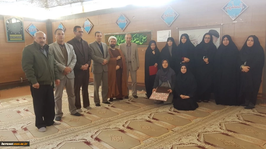آیین غبار روبی مزارشهدا وتجلیل از خانواده محترم شهدای کارکنان دانشکده فنی خرم آباد 5